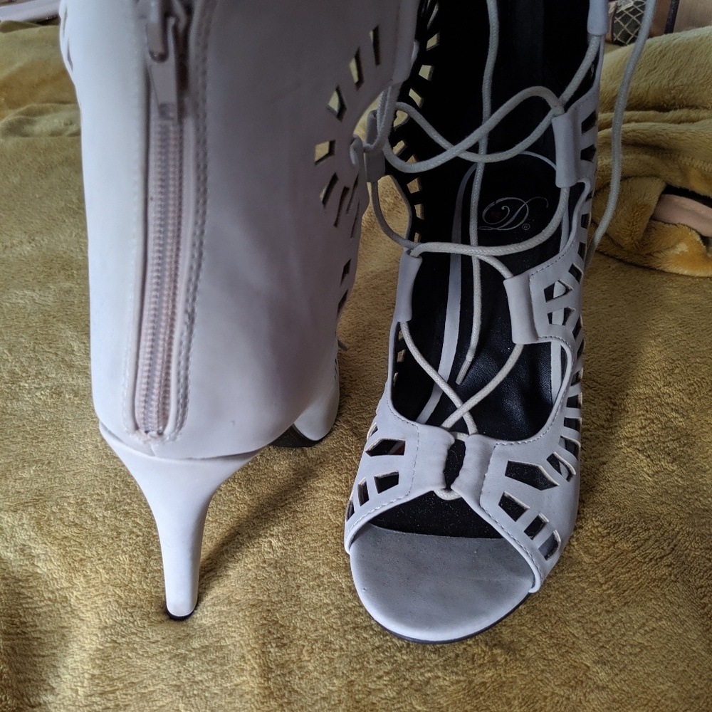 Ladies off-white cut-out heels